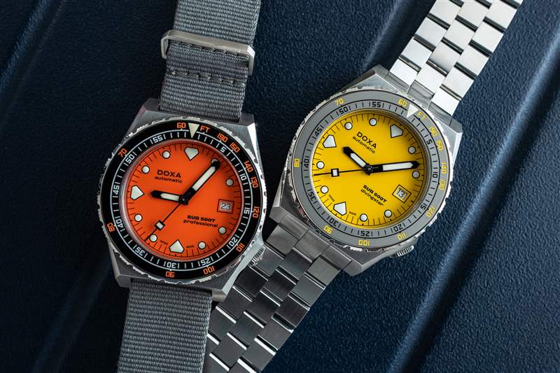 藍(lán)色背景上的黃色和橙色 Doxa 600T。